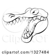 Clipart Of A Black And White Aggressive Snapping Alligator Mascot Head Royalty Free Vector Illustration by AtStockIllustration