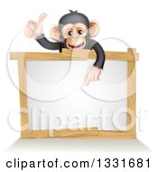 Poster, Art Print Of Cartoon Black And Tan Happy Baby Chimpanzee Monkey Giving A Thumb Up And Pointing Down To A Blank White Sign