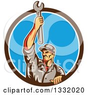 Poster, Art Print Of Retro Male Mechanic Holding A Wrench Above His Head In A Brown White And Blue Circle