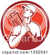 Poster, Art Print Of Retro Male Plumber Holding A Monkey Wrench In A Red And White Circle