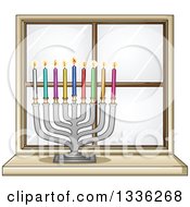 Silver Hanukkah Menorah Lamp With Colorful Candles On The Inside Of A Window