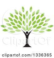 Clipart Of A Black Silhouetted Man Forming The Trunk Of A Tree With Green Leaves Royalty Free Vector Illustration by ColorMagic #COLLC1336365-0187
