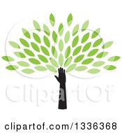 Silhouetted Hand And Arm Forming The Trunk Of A Tree With Green Spring Leaves