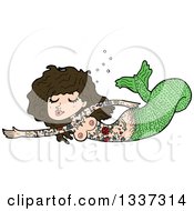 Clipart Of A Cartoon Green Topless Tattooed Brunette White Mermaid Swimming Royalty Free Vector Illustration