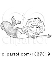 Lineart Clipart Of A Cartoon Black And White Mermaid Swimming Royalty Free Outline Vector Illustration