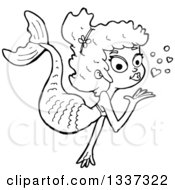 Lineart Clipart Of A Cartoon Black And White Mermaid Blowing A Kiss Royalty Free Outline Vector Illustration