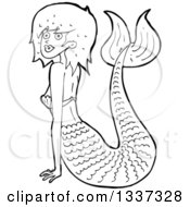 Lineart Clipart Of A Cartoon Black And White Mermaid Propped Up With Her Arms Royalty Free Outline Vector Illustration by lineartestpilot