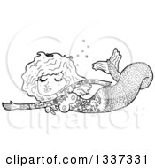 Lineart Clipart Of A Cartoon Black And White Tattooed Topless Mermaid Swimming Royalty Free Outline Vector Illustration by lineartestpilot
