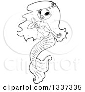 Lineart Clipart Of A Cartoon Black And White Mermaid Royalty Free Outline Vector Illustration