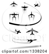 Clipart Of Black Silhouetted Airplanes And Contrails 2 Royalty Free Vector Illustration