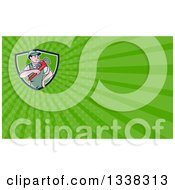 Clipart Of A Retro Cartoon White Male Plumber Holding A Giant Monkey Wrench In A Shield And Green Rays Background Or Business Card Design Royalty Free Illustration