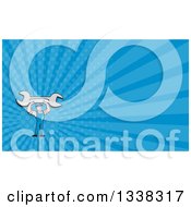 Poster, Art Print Of Cartoon White Male Mechanic Holding Up A Giant Wrench And Blue Rays Background Or Business Card Design