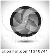 Clipart Of A Floating Grayscale Camera Shutter Lens Over Shading Royalty Free Vector Illustration