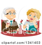 Happy Senior Caucasian Couple Dining At A Fine Restaurant