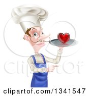 Poster, Art Print Of White Male Chef With A Curling Mustache Holding A Heart On A Tray And Pointing