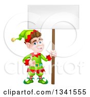 Poster, Art Print Of Cartoon Happy Male Christmas Elf Giving A Thumb Up And Holding A Blank Sign