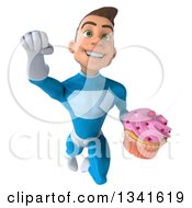 Clipart Of A 3d Young White Male Super Hero In A Light Blue Suit Holding A Pink Frosted Cupcake And Flying Royalty Free Illustration