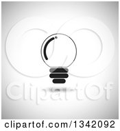 Clipart Of A Round Black Light Bulb Over Shading Royalty Free Vector Illustration