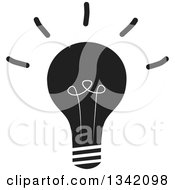 Clipart Of A Black And White Shining Light Bulb Royalty Free Vector Illustration