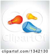 Clipart Of Red Orange And Blue Light Bulbs Over Shading Royalty Free Vector Illustration