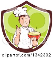 Clipart Of A Retro Cartoon Male Chef Holding A Hot Bowl Of Soup In A Brown White And Green Shield Royalty Free Vector Illustration