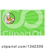 Poster, Art Print Of Cartoon Caucasian Male Chef Baker Holding A Loaf Of Bread In A Circle And Green Rays Background Or Business Card Design
