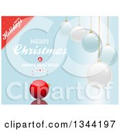 Poster, Art Print Of 3d Suspended Shiny Ornaments Over Merry Christmas And Happy New Year Happy Holidays Text On Blue