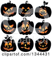 Clipart Of Illuminated Halloween Jackolantern Pumpkins Royalty Free Vector Illustration