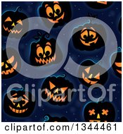 Seamless Background Pattern Of Illuminated Halloween Jackolantern Pumpkins Over Midnight Blue