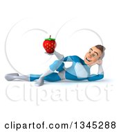 Clipart Of A 3d Young White Male Super Hero In A Light Blue Suit Holding A Strawberry And Resting On His Side Royalty Free Illustration