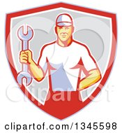 Clipart Of A Retro White Male Mechanic Holding A Wrench In A Shield Royalty Free Vector Illustration