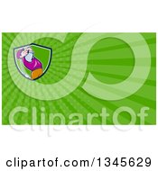 Clipart Of A Cartoon White Male Golfer Swinging In A Shield And Green Rays Background Or Business Card Design Royalty Free Illustration