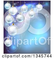 Christmas Background With 3d Suspended Bauble Ornaments Over Blue Magic Lights