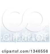 Clipart Of A Pastel Blue Background With Snowflakes Royalty Free Vector Illustration by dero
