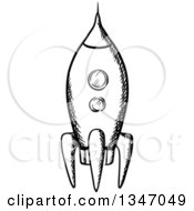 Clipart Of A Black And White Sketched Rocket Royalty Free Vector Illustration