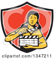 Poster, Art Print Of Retro Female Asian Film Crew Worker Holding A Clapper In A Black White And Red Shield