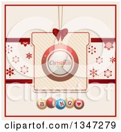 Poster, Art Print Of Suspended Red Merry Christmas Bauble Ornament On A Gift With A Snowflake Banner Over Bingo Balls