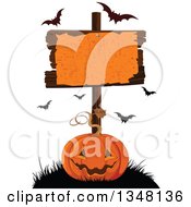 Poster, Art Print Of Carved Halloween Jackolantern Pumpkin Under A Blank Sign With Flying Bats