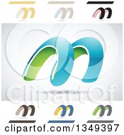 Clipart Of Abstract Letter M Logo Design Elements Royalty Free Vector Illustration