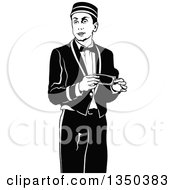 Black And White Bellboy Or Bellhop Hotel Worker Man Holding A Cash Tip