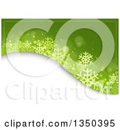 Poster, Art Print Of Green Blue Christmas Background Of Snowflakes And Flares Over A White Hill
