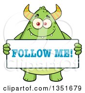 Poster, Art Print Of Cartoon Chubby Green Horned Monster Holding A Follow Me Sign