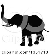 Clipart Of A Black Silhouetted Elephant Walking 3 Royalty Free Vector Illustration