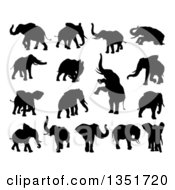 Clipart Of Black Silhouetted Elephants Royalty Free Vector Illustration