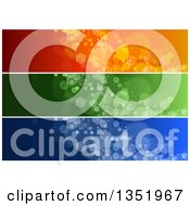 Clipart Of Orange Green And Blue Sparkle Website Header Banners Royalty Free Vector Illustration by dero