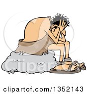 Cartoon Stressed Caveman Sitting On A Boulder And Resting His Head In His Hands