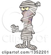 Cartoon Halloween Mummy Holding Up A Finger