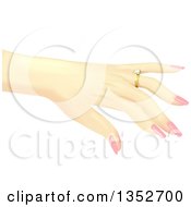 Caucasian Womans Hand Showing Off A Diamond Ring