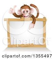 Cartoon Brown Happy Baby Chimpanzee Monkey Giving A Thumb Up And Pointing Down To A Blank White Sign