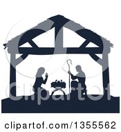 Clipart Of A Navy Blue Silhouetted Mary And Joseph Praying Over Baby Jesus In A Manger Royalty Free Vector Illustration by AtStockIllustration